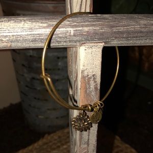 Gold tone Alex and ani flower bracelet.